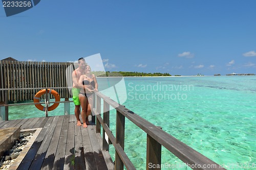 Image of happy young  couple at summer vacation have fun and relax at bea