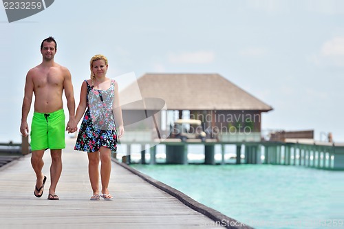 Image of happy young  couple at summer vacation have fun and relax at bea
