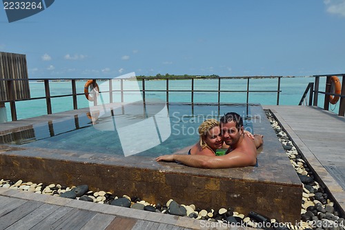 Image of happy young  couple at summer vacation have fun and relax at bea