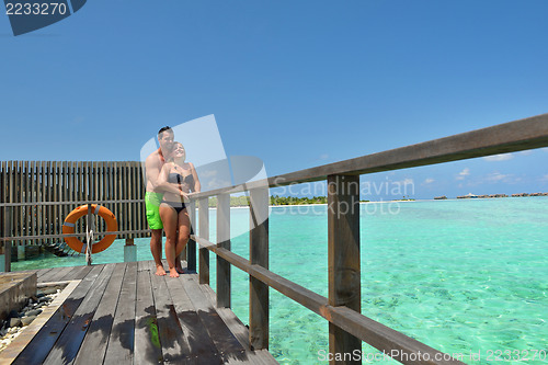 Image of happy young  couple at summer vacation have fun and relax at bea