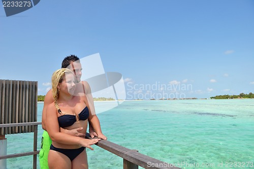 Image of happy young  couple at summer vacation have fun and relax at bea