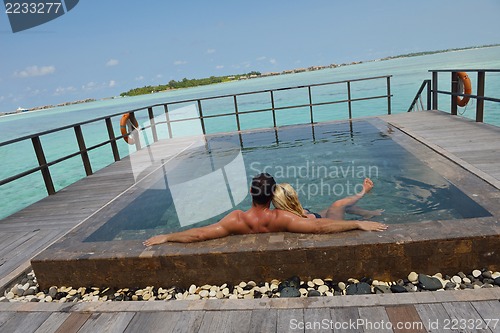 Image of happy young  couple at summer vacation have fun and relax at bea