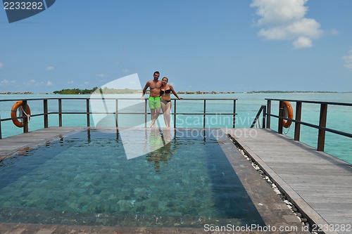 Image of happy young  couple at summer vacation have fun and relax at bea