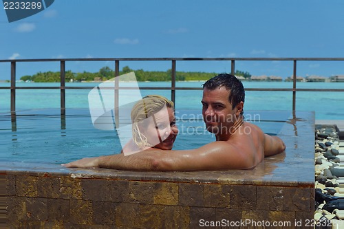 Image of happy young  couple at summer vacation have fun and relax at bea
