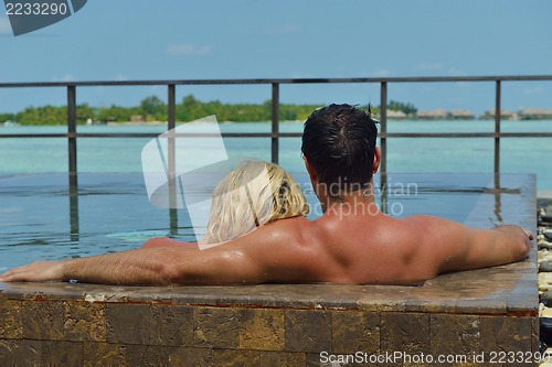 Image of happy young  couple at summer vacation have fun and relax at bea