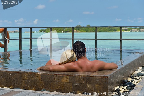 Image of happy young  couple at summer vacation have fun and relax at bea