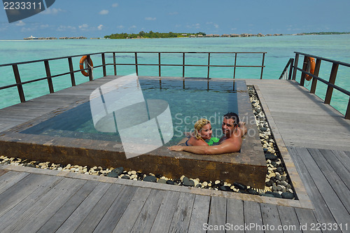 Image of happy young  couple at summer vacation have fun and relax at bea