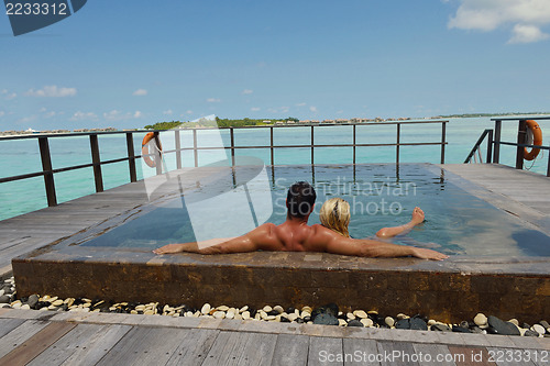 Image of happy young  couple at summer vacation have fun and relax at bea