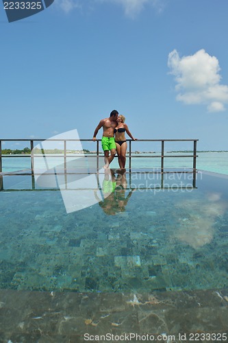 Image of happy young  couple at summer vacation have fun and relax at bea