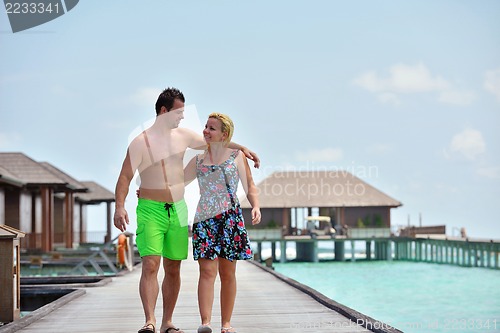 Image of happy young  couple at summer vacation have fun and relax at bea