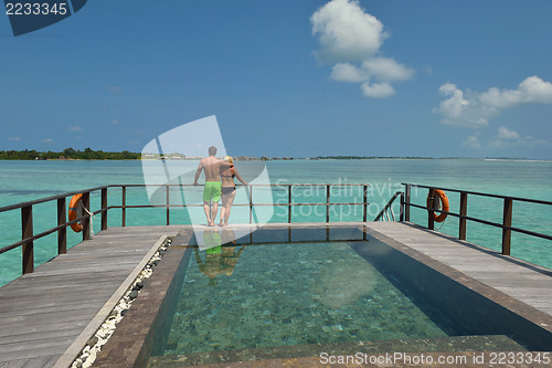 Image of happy young  couple at summer vacation have fun and relax at bea