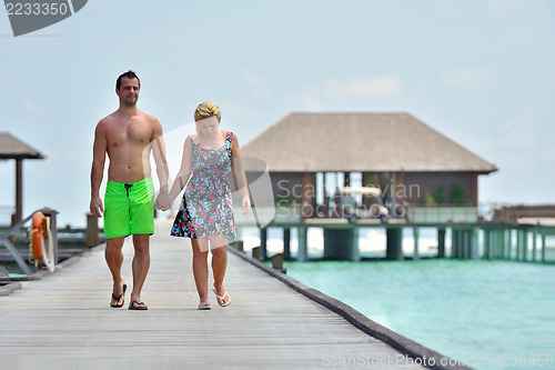 Image of happy young  couple at summer vacation have fun and relax at bea
