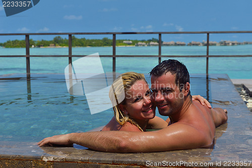Image of happy young  couple at summer vacation have fun and relax at bea