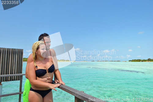 Image of happy young  couple at summer vacation have fun and relax at bea
