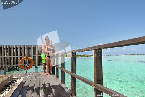 Image of happy young  couple at summer vacation have fun and relax at bea