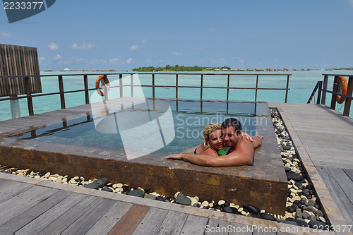 Image of happy young  couple at summer vacation have fun and relax at bea