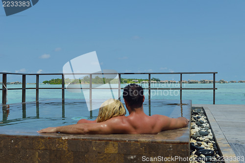 Image of happy young  couple at summer vacation have fun and relax at bea