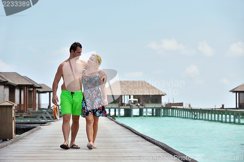 Image of happy young  couple at summer vacation have fun and relax at bea