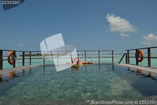 Image of happy young  couple at summer vacation have fun and relax at bea