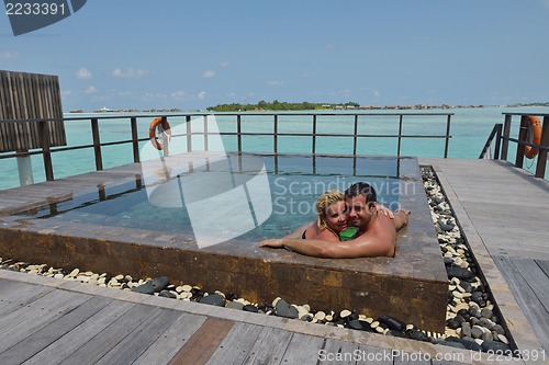 Image of happy young  couple at summer vacation have fun and relax at bea