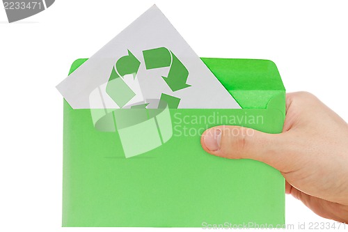 Image of Hand holding ecology envelope
