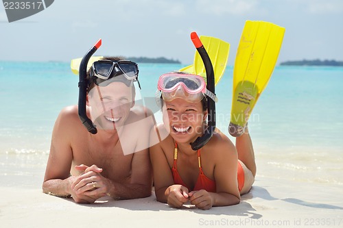 Image of happy young couple have fun on beach