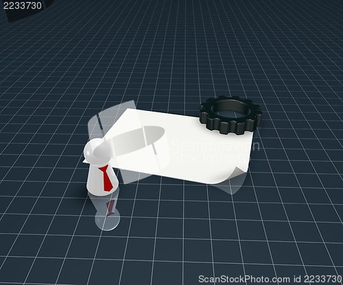 Image of cogwheel and play figure