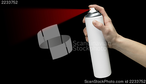 Image of hand and aerosol can