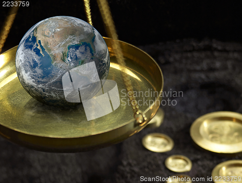 Image of scales and globe