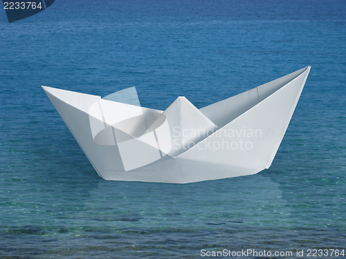 Image of swimming paper boat