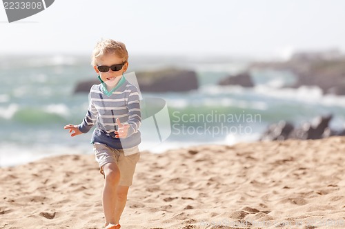 Image of little boy at the beach