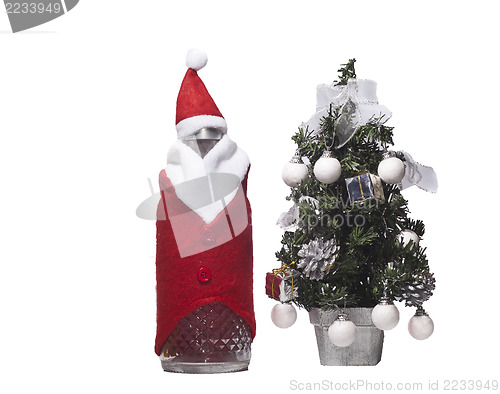 Image of  bottle of christmas and tree