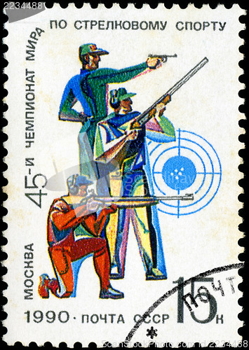 Image of USSR - CIRCA 1990: A stamp printed in USSR shows men with a weap
