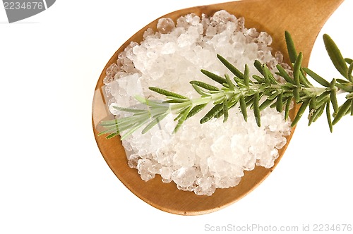 Image of sea salt with rosemary on a wooden spoon
