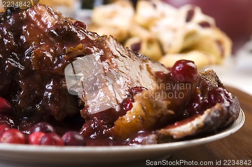 Image of Delicious Scrambled Grilled meat with cranberry sauce 