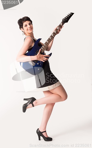 Image of Attractive girl with guitar