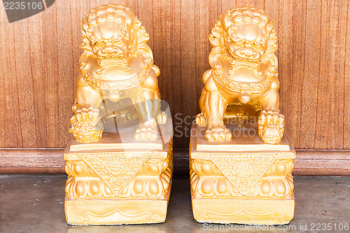 Image of Chinese style figurine couple golden singha