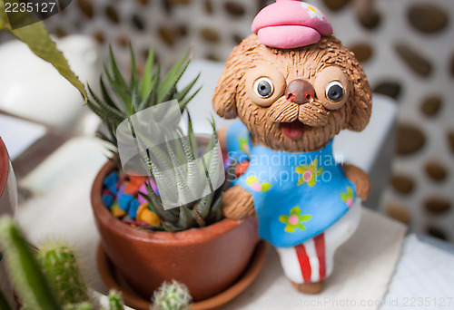Image of Paint doll clay ornamental potted plants on table