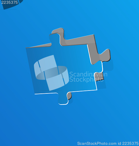 Image of Cut out puzzle piece, blue paper