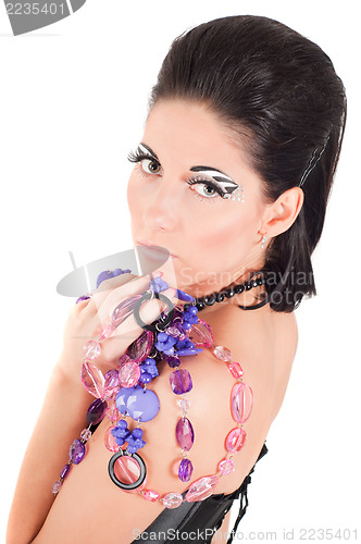 Image of Portrait of woman with face art