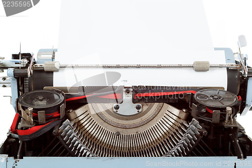 Image of retro typewriter close up with entered paper