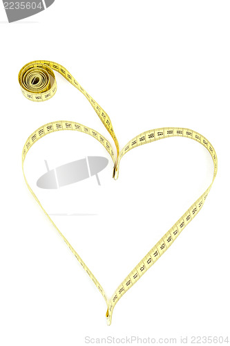 Image of Tape measure heart shape - health, weight concept 