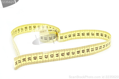 Image of Tape measure heart shape - health, weight concept 