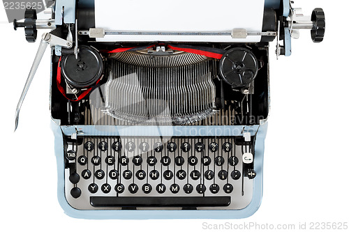 Image of retro uncovered blue typewriter