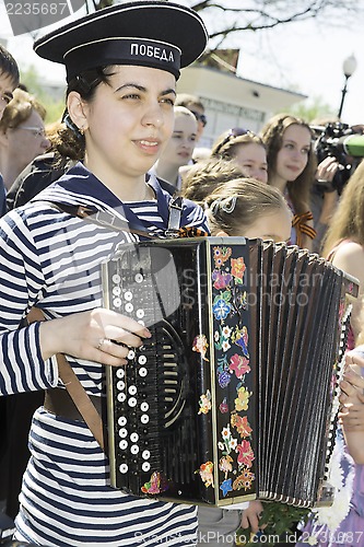 Image of Girl with accordion