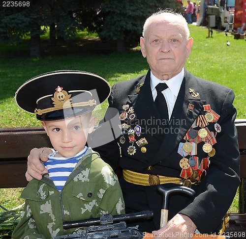 Image of Grandfather and grandson on Victory Day