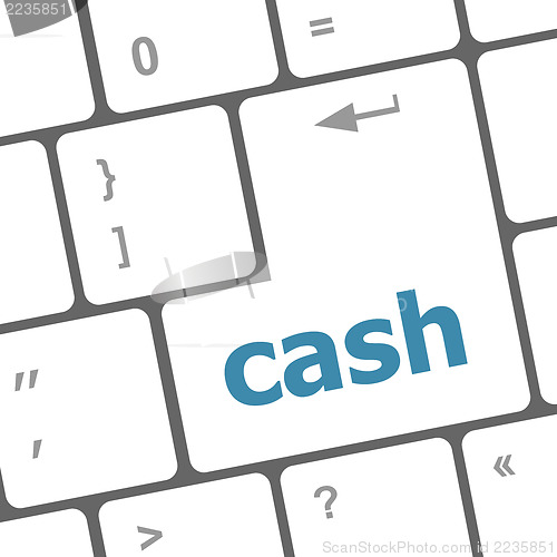 Image of cash button on computer keyboard showing business concept