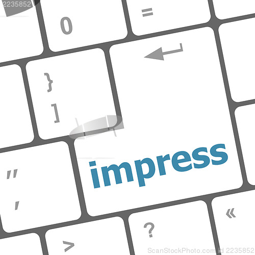 Image of impress word on computer pc keyboard key