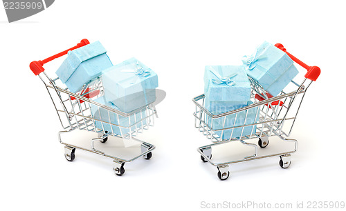 Image of Cyan gift boxes in shopping carts