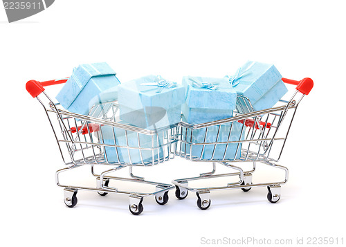 Image of Cyan gift boxes in shopping carts